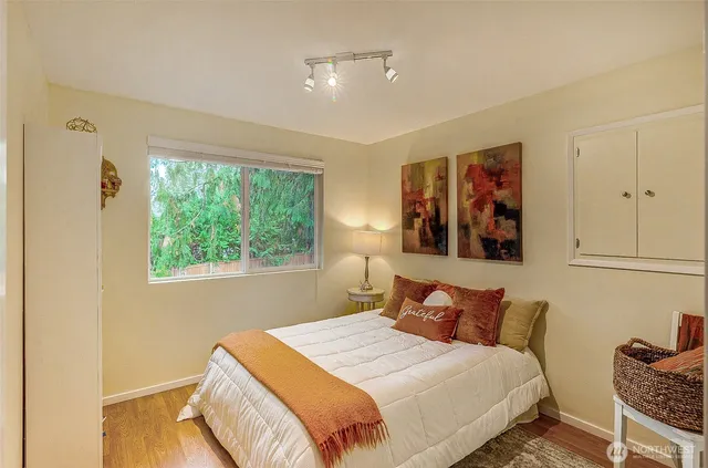 a view of backyard with swimming pool and furniture