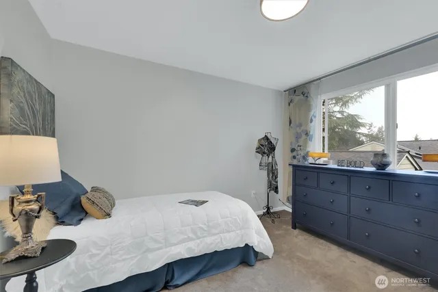 a view of a house with furniture and garden