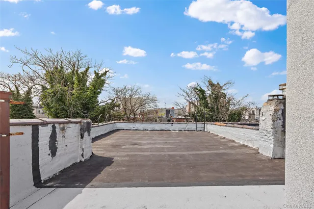 a view of a city street from a building