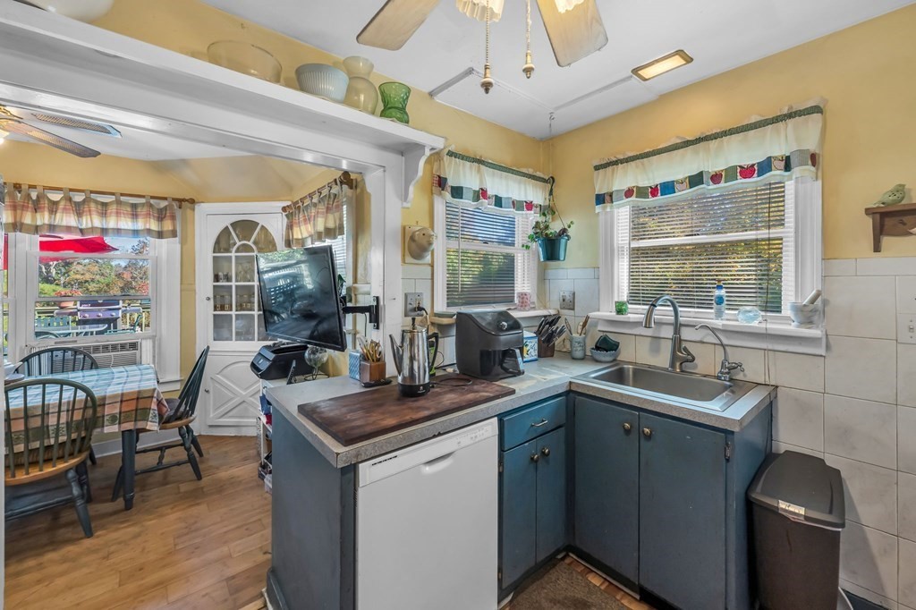 66 Chapin Road Hampden, MA 01036 - Photo 11 of 31 a kitchen with sink cabinets and outdoor living room
