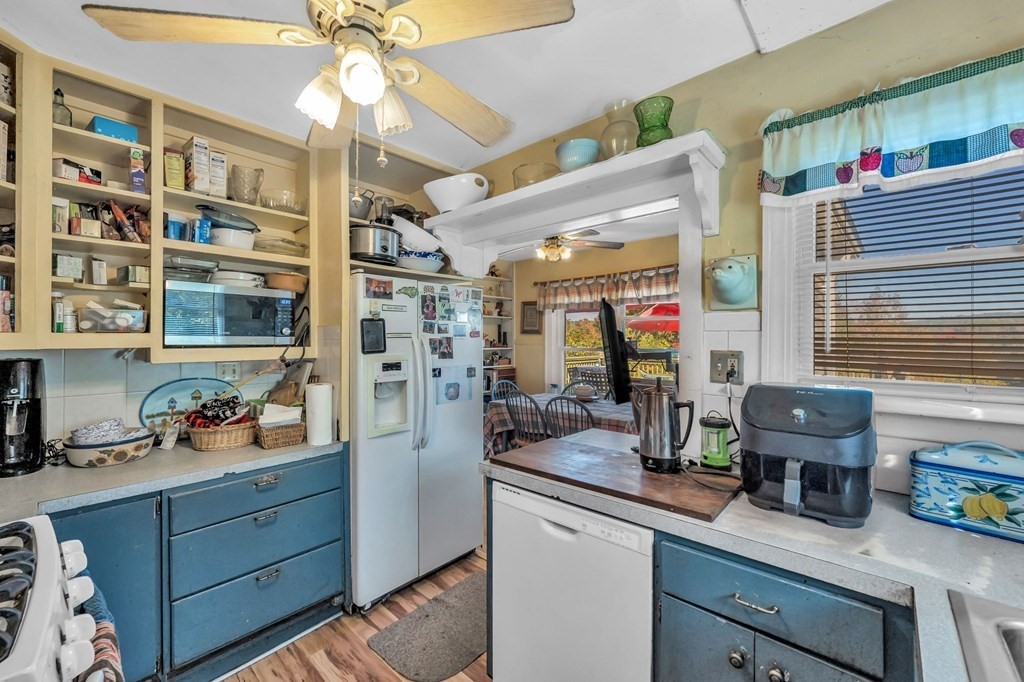 66 Chapin Road Hampden, MA 01036 - Photo 12 of 31 a kitchen with a refrigerator and a sink