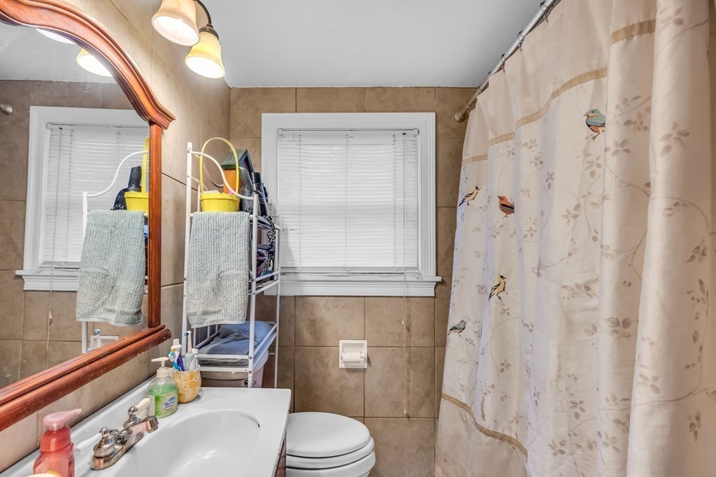 66 Chapin Road Hampden, MA 01036 - Photo 13 of 31 a bathroom with a toilet sink and shower