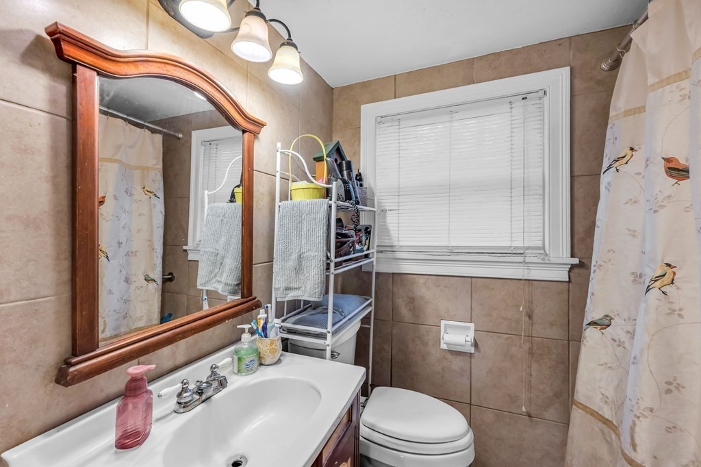 66 Chapin Road Hampden, MA 01036 - Photo 14 of 31 a bathroom with a sink a toilet and shower