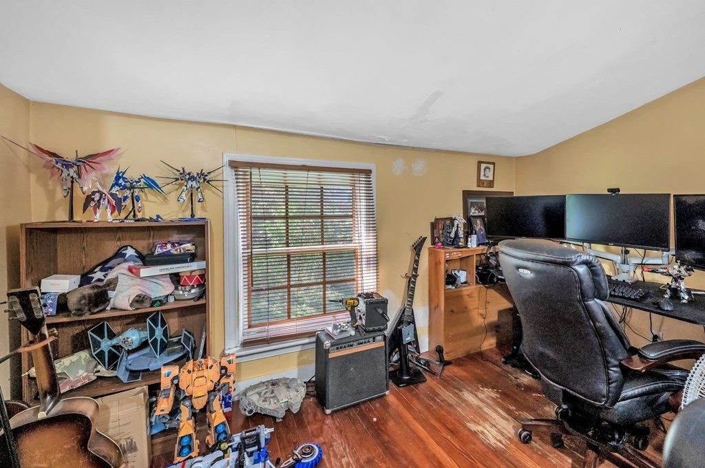 66 Chapin Road Hampden, MA 01036 - Photo 18 of 31 a view of a workspace with furniture and a window