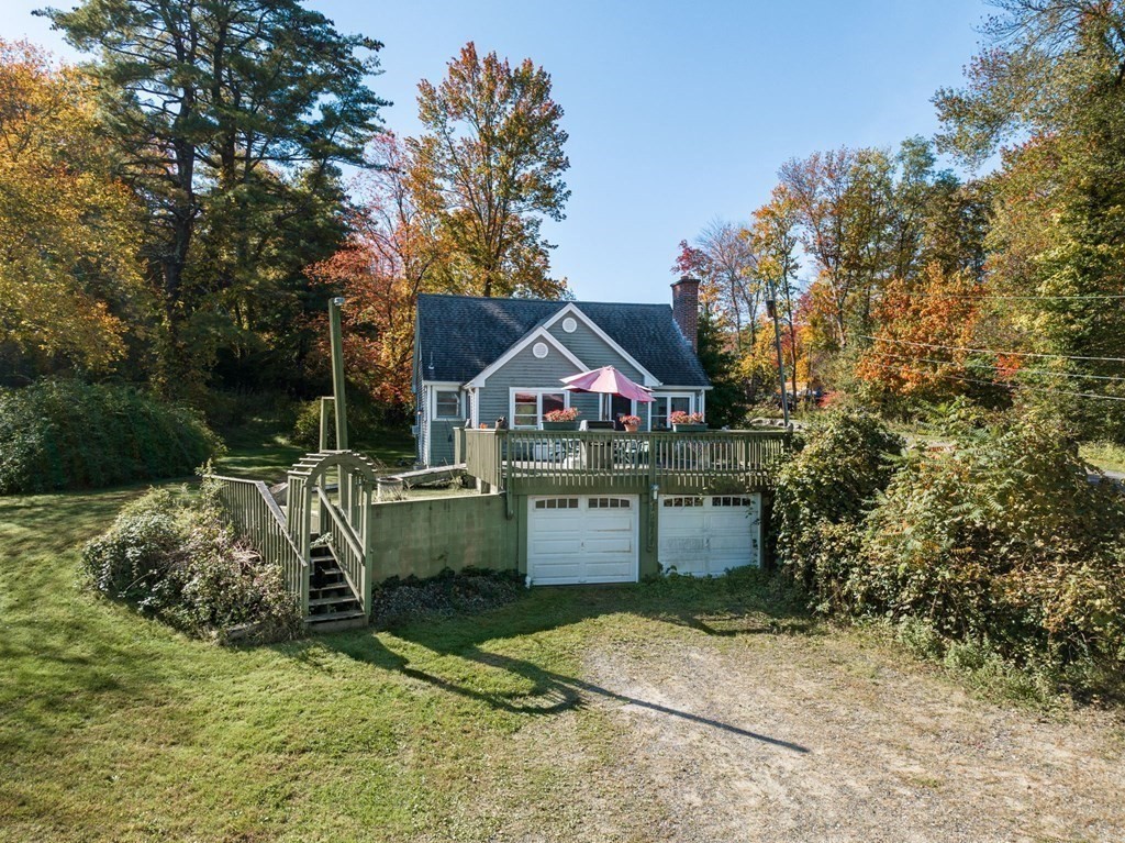 66 Chapin Road Hampden, MA 01036 - Photo 20 of 31 a front view of a house with garden