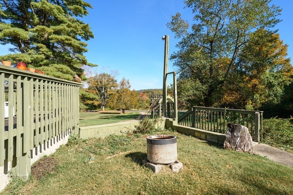 66 Chapin Road Hampden, MA 01036 - Photo 24 of 31 a view of a chair and table on the deck