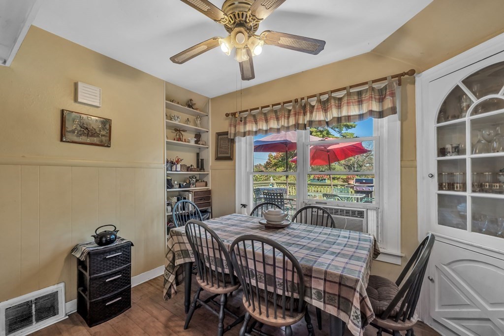 66 Chapin Road Hampden, MA 01036 - Photo 7 of 31 a view of a dining room with furniture a rug and chandelier