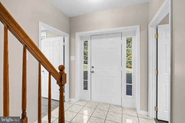 a view of an entryway with staircase