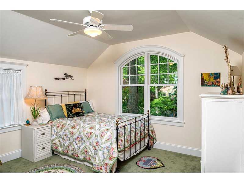 91 Valleywood Road Cos Cob, CT 06807 - Photo 15 of 18 a bedroom with a bed a window and potted plant