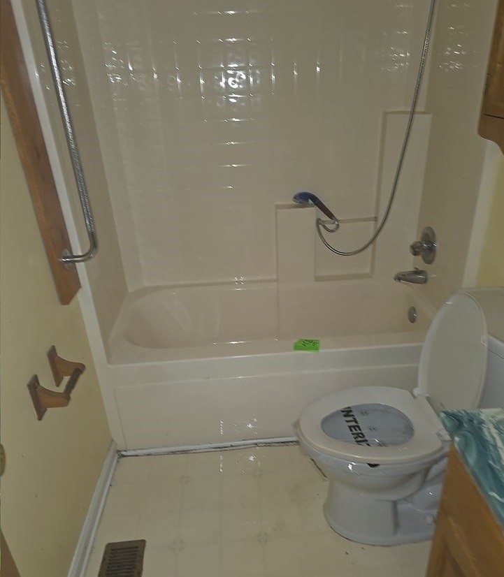 2174 Pleasant Hill Road Lynchburg, TN 37352 - Photo 3 of 16 a bathroom with a toilet and a shower