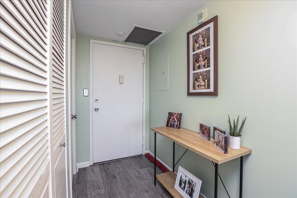402 Paradise Road, Unit PHJ Swampscott, MA 01907 - Photo 3 of 27 a room with storage and utility