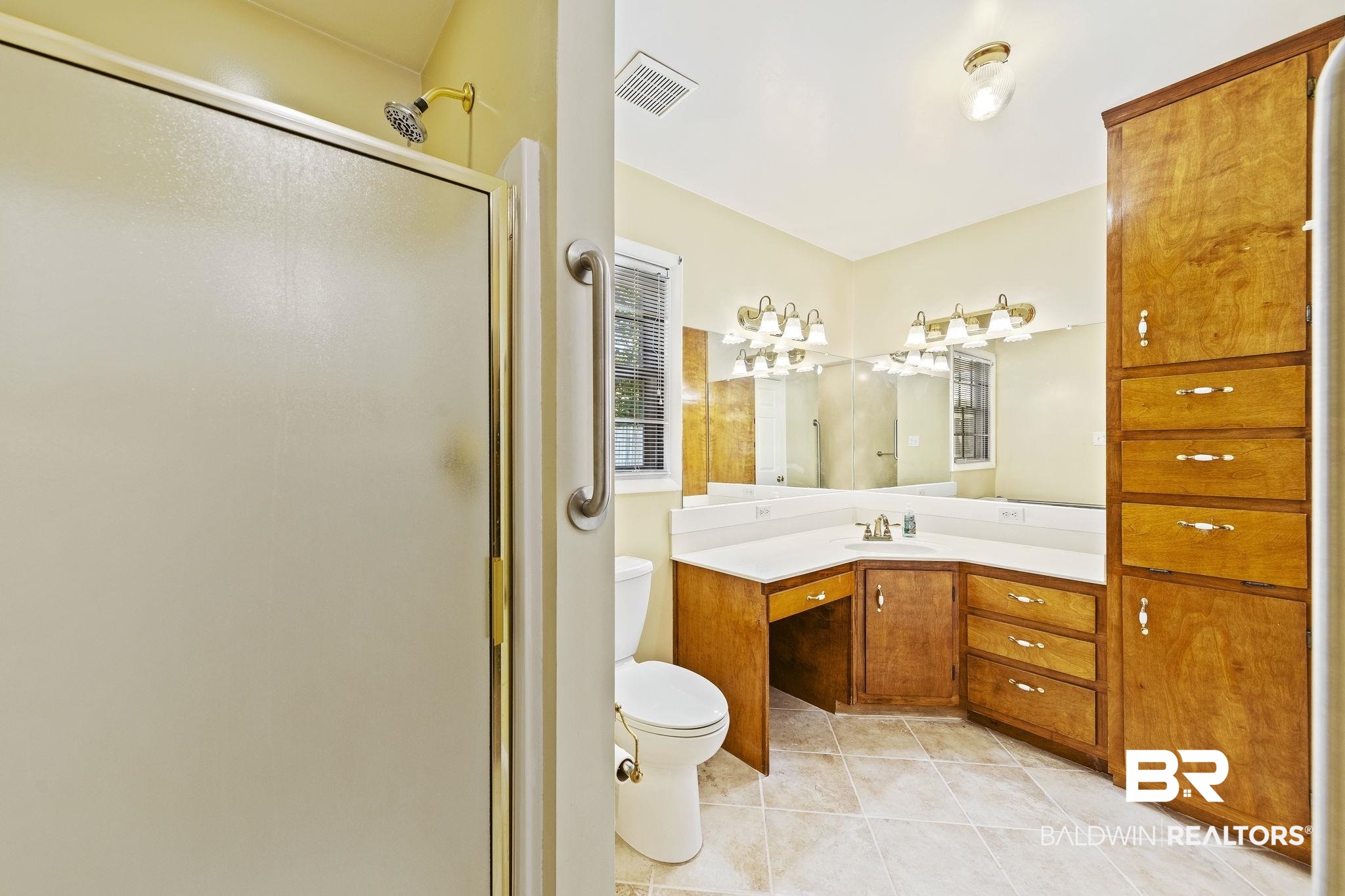 4366 Barden Avenue Mobile, AL 36619 - Photo 24 of 40 Bathroom with tile patterned floors, an enclosed shower, vanity, and toilet