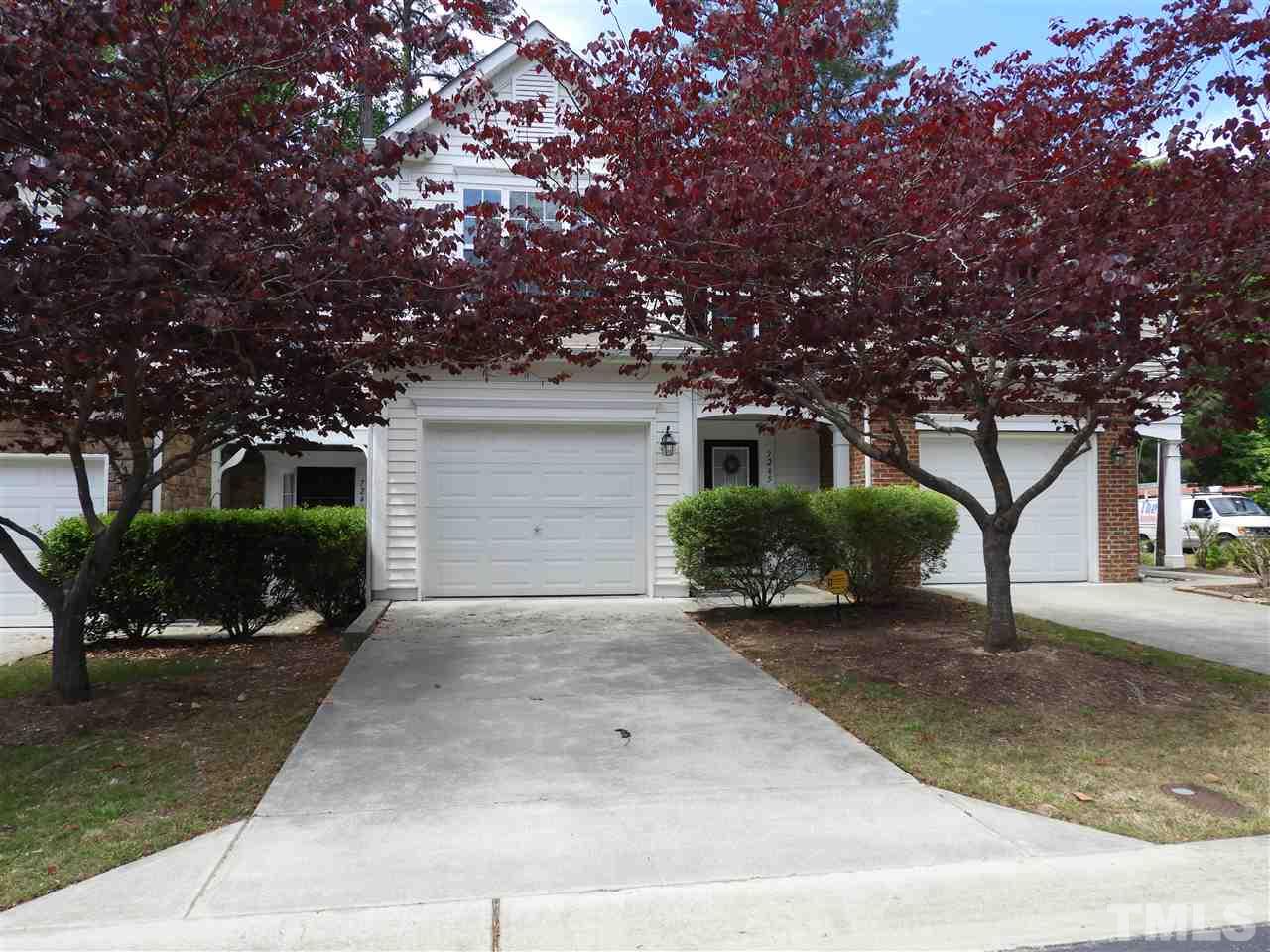 7245 Racine Way Raleigh, NC 27690 - Photo 1 of 29 a view of a house with a yard