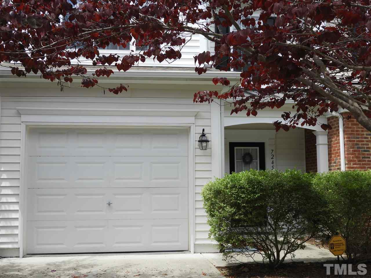 7245 Racine Way Raleigh, NC 27690 - Photo 2 of 29 a view of house with outdoor space and trees
