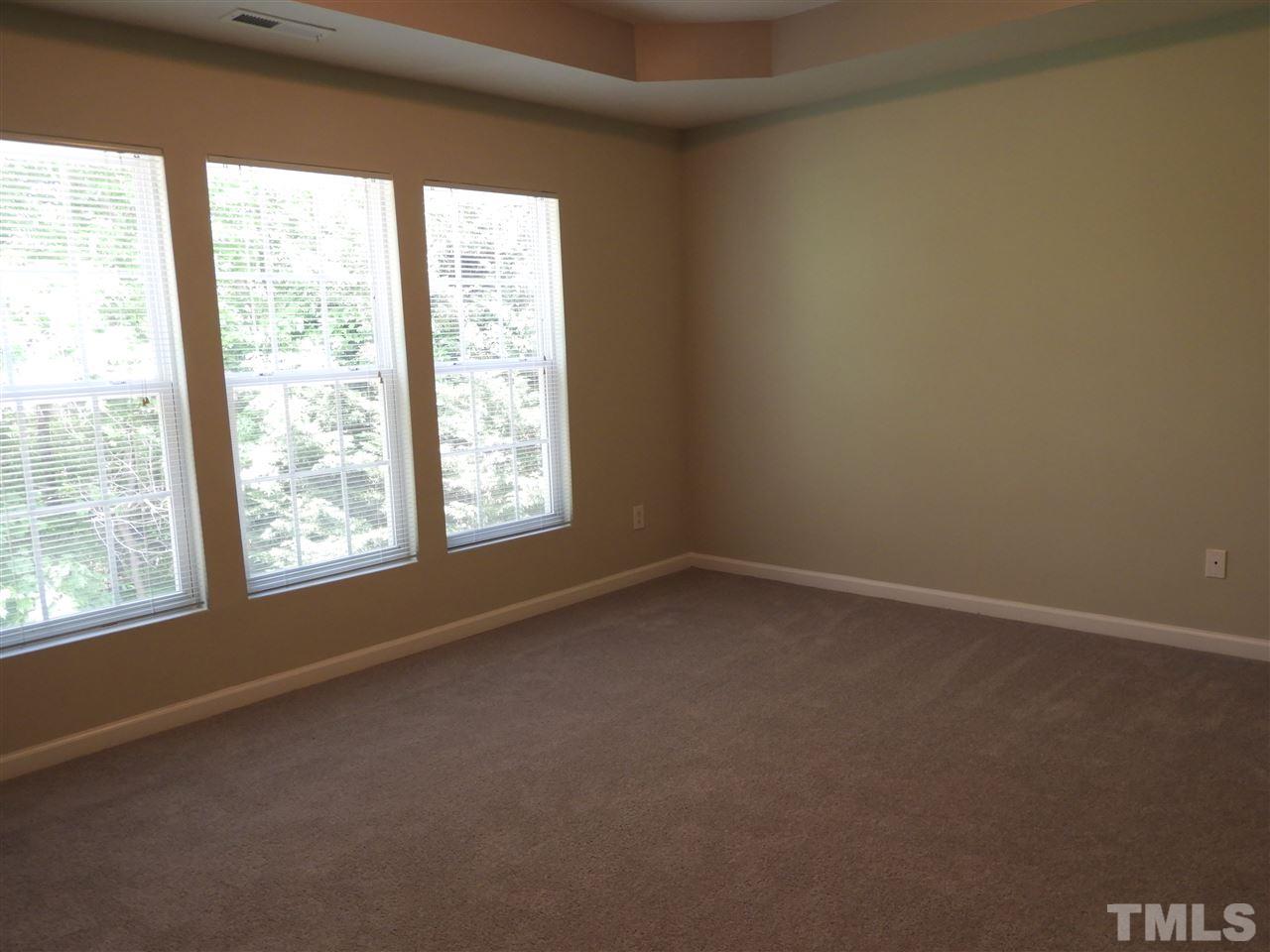7245 Racine Way Raleigh, NC 27690 - Photo 18 of 29 an empty room with a window