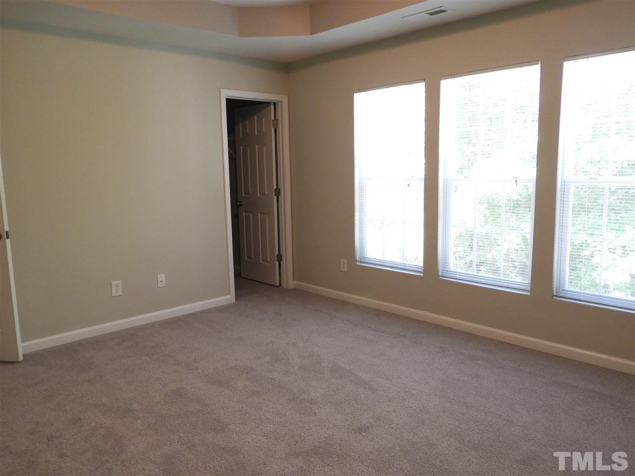 7245 Racine Way Raleigh, NC 27690 - Photo 19 of 29 an empty room with a window