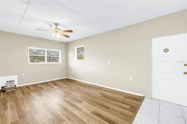 a view of an empty room with a window