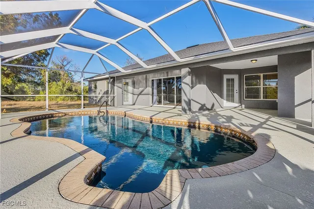 a view of a patio with swimming pool