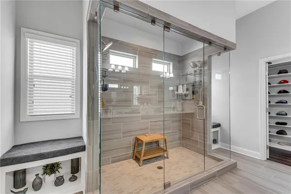a bathroom with a double vanity sink mirror and double