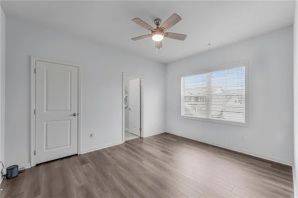 a view of a house with backyard porch and garden