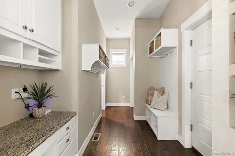 a hallway with wooden floor