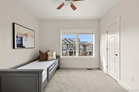 a living room with furniture and window