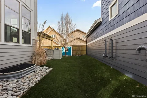 a view of a back yard of the house