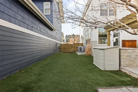 a view of a back yard of the house
