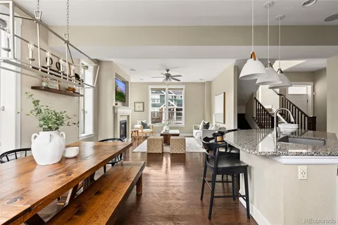 a very nice looking dining room with a table and chairs