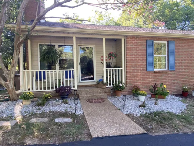 a view of a backyard with a garden