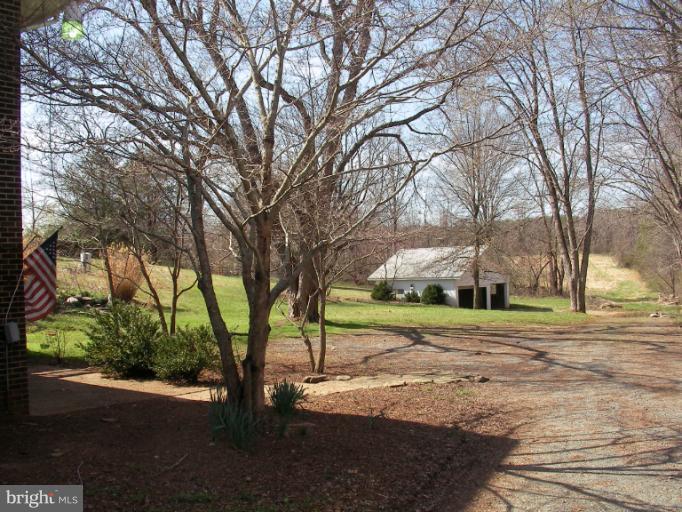 171 Tacketts Mill Road Stafford, VA 22556 - Photo 3 of 15 Backyard View of Land and Garage