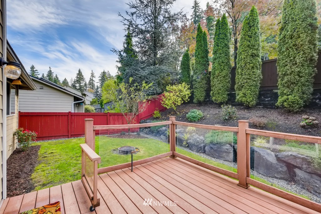 3306 201st Place Southeast Bothell, WA 98012 - Photo 15 of 28 a view of a backyard with sitting area