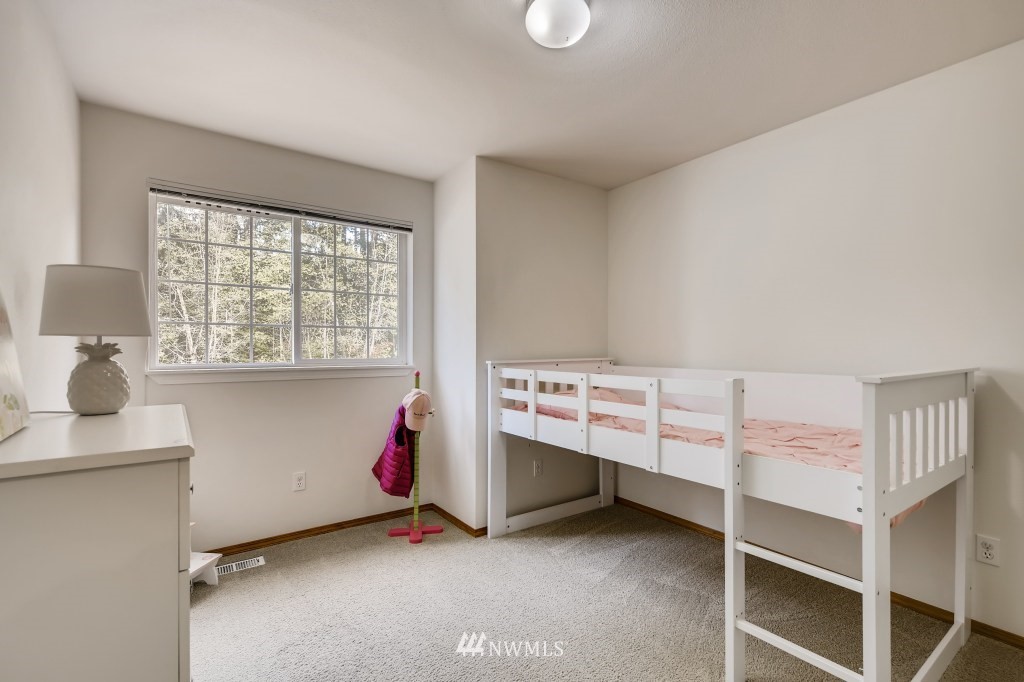 3306 201st Place Southeast Bothell, WA 98012 - Photo 22 of 28 a room with toys and a window