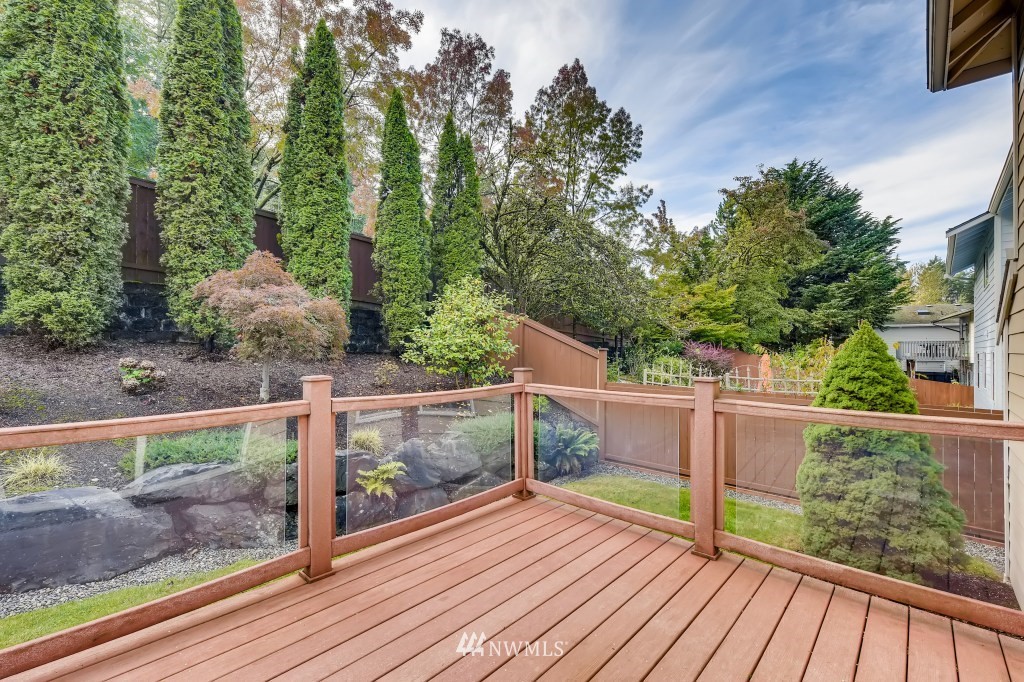 3306 201st Place Southeast Bothell, WA 98012 - Photo 6 of 28 a view of a balcony with wooden floor