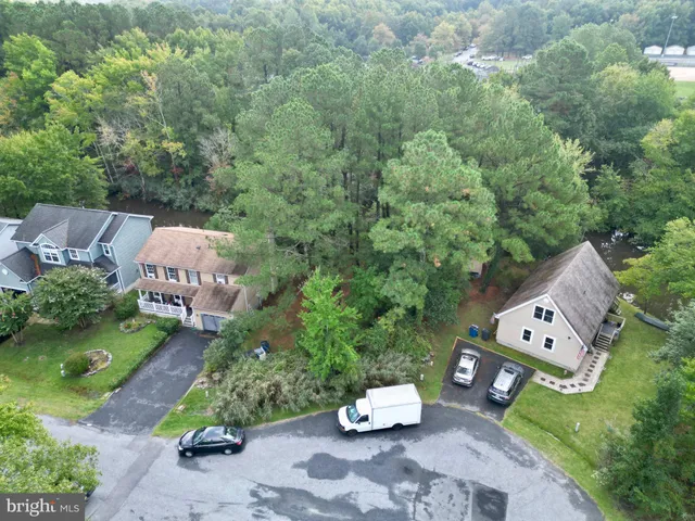 an aerial view of a house with outdoor space patio and mountain view
