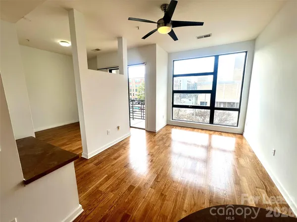 a view of an empty room and window
