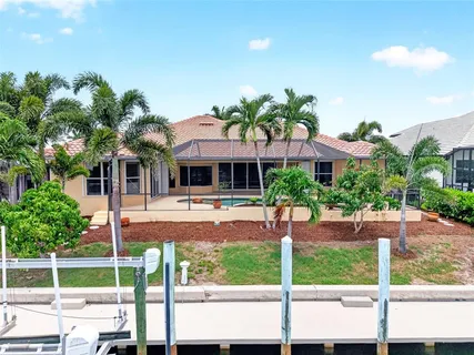 an aerial view of residential houses and outdoor space