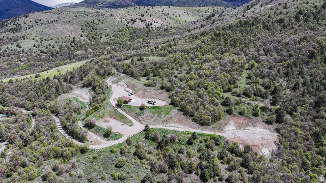 916 North Bonneville Road Preston, ID 83263 - Photo 17 of 37 Drone / aerial view of a forest and a mountain backdrop