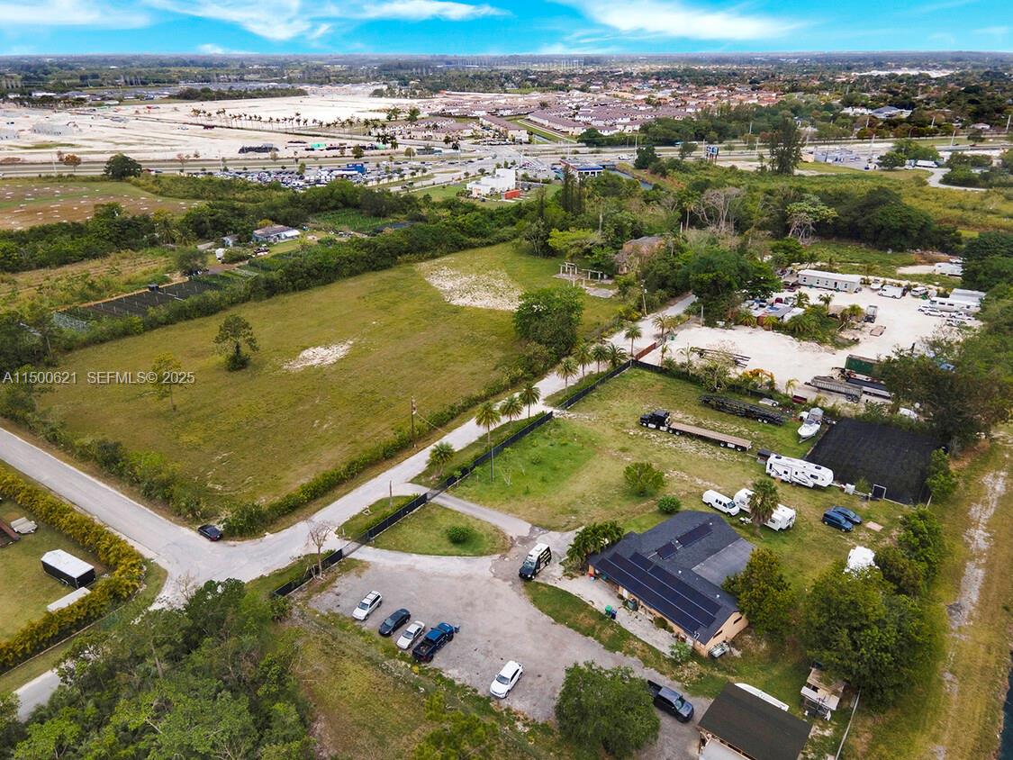 12501 Southwest 236th Street Homestead, FL 33032 - Photo 12 of 14 an aerial view of residential houses with outdoor space