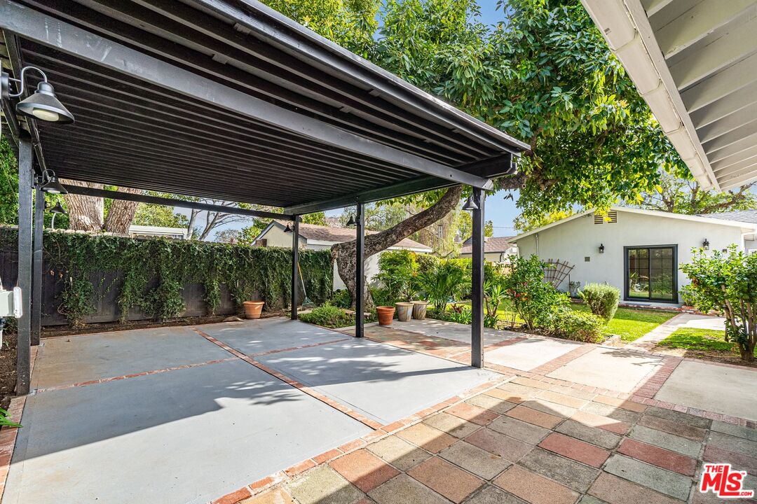 529 Coolidge Drive San Gabriel, CA 91775 - Photo 11 of 11 a patio with a table and chairs and potted plants