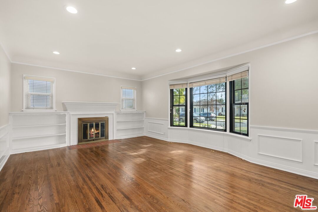 529 Coolidge Drive San Gabriel, CA 91775 - Photo 3 of 11 a view of an empty room with wooden floor and a window