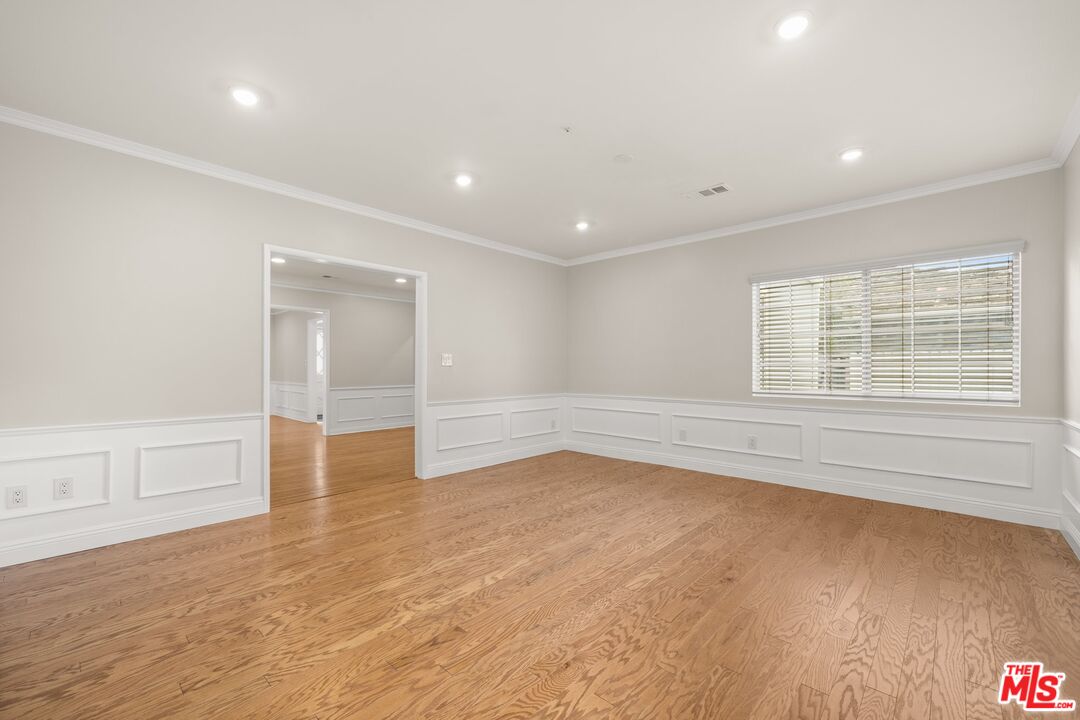 529 Coolidge Drive San Gabriel, CA 91775 - Photo 7 of 11 wooden floor in an empty room with a window