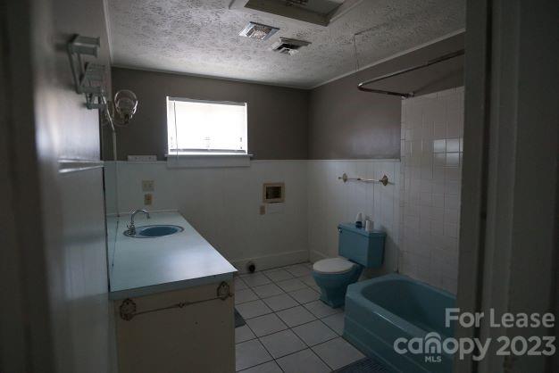 464 Steel Bridge Loop, Unit B Hickory, NC 28601 - Photo 6 of 7 a bathroom with a sink toilet and shower