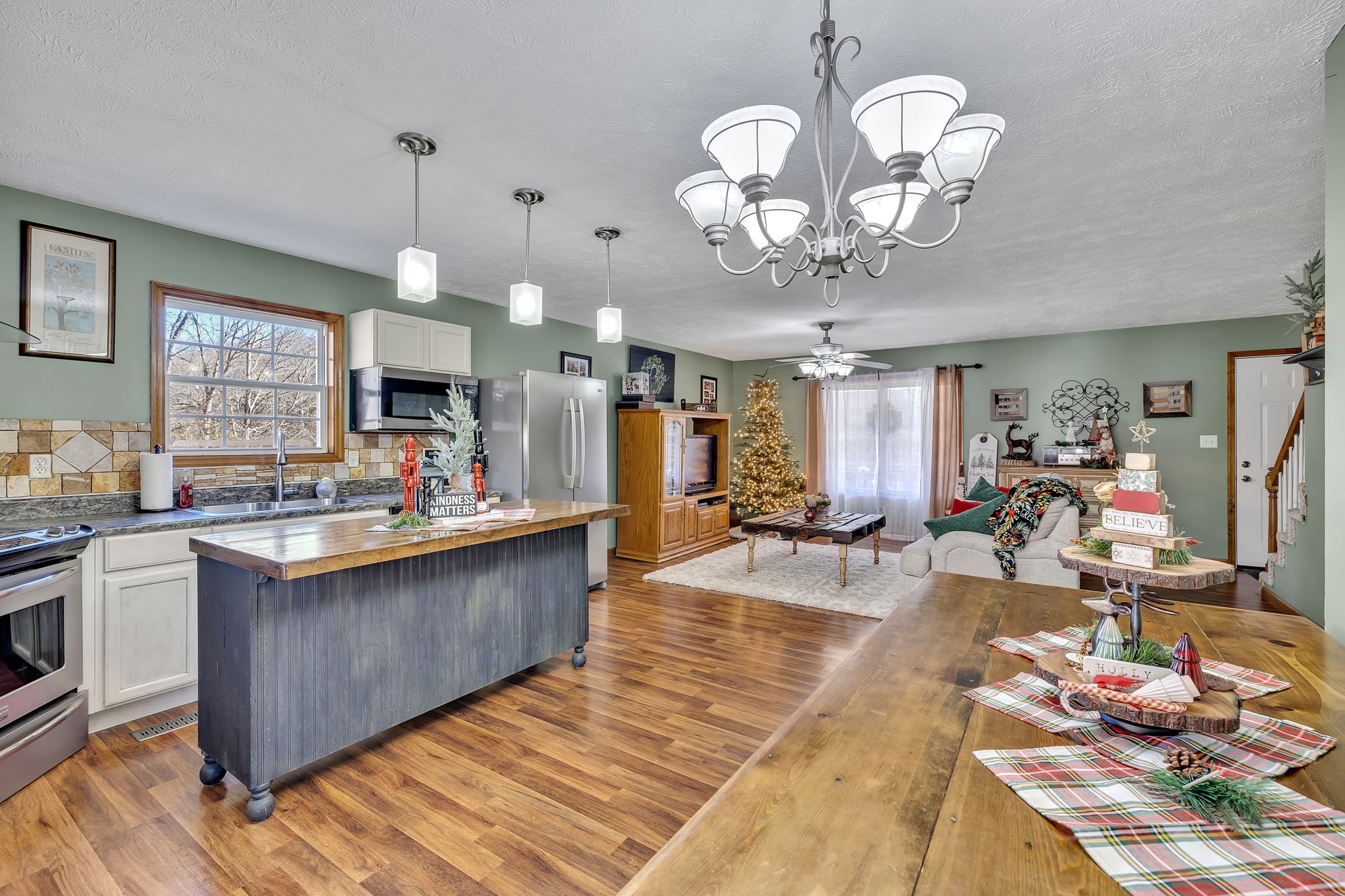 293 Slippery Road Hohenwald, TN 38462 - Photo 20 of 36 a large kitchen with lots of counter space cabinetry and appliances