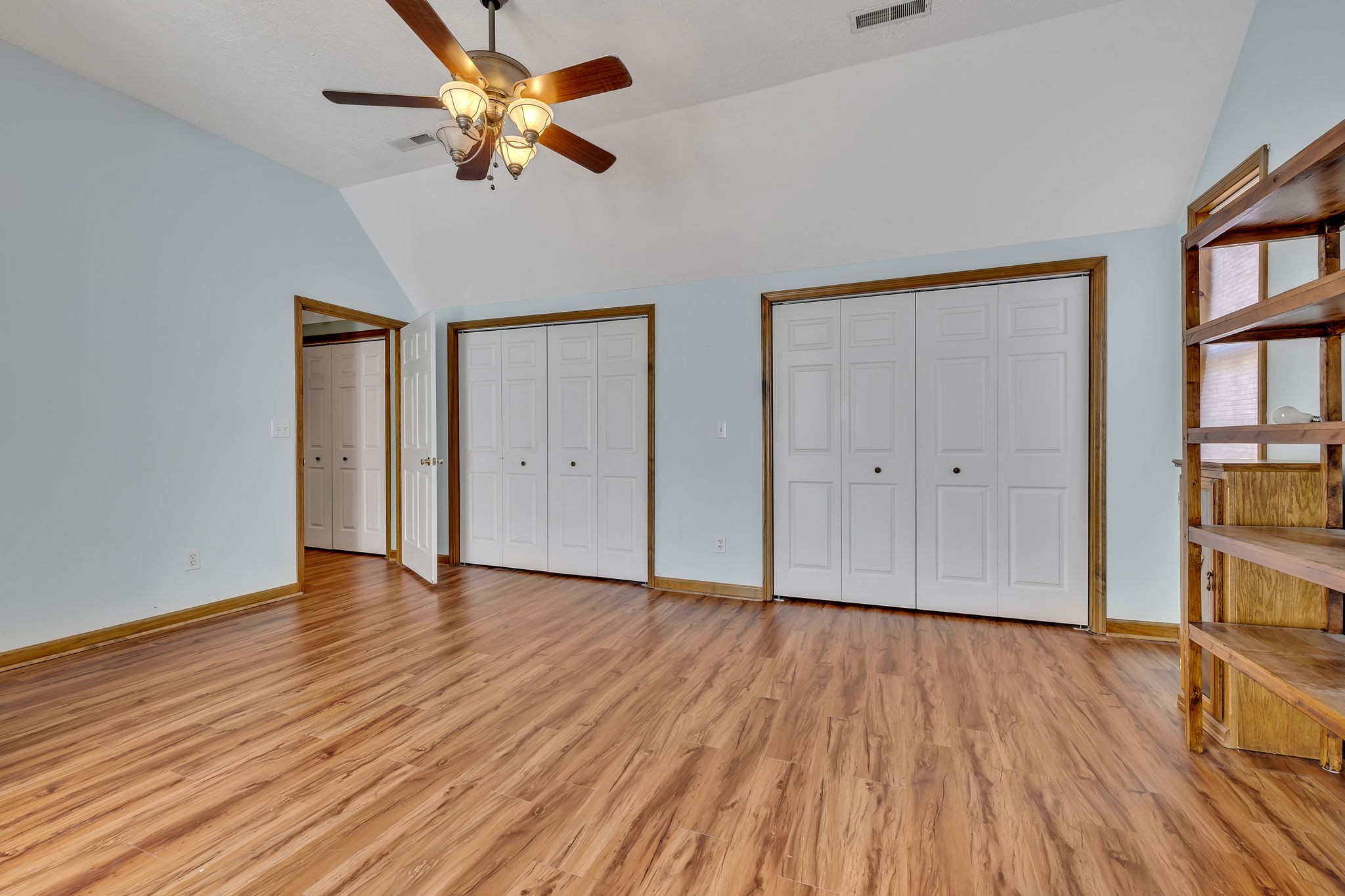 293 Slippery Road Hohenwald, TN 38462 - Photo 28 of 36 a view of empty room with wooden floor and fan