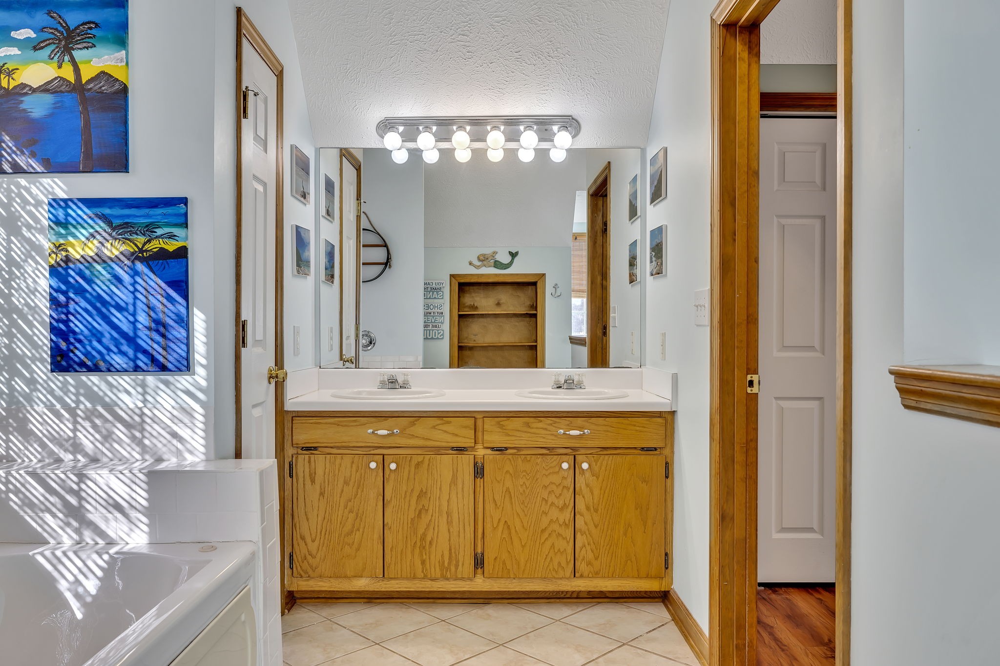 293 Slippery Road Hohenwald, TN 38462 - Photo 30 of 36 a bathroom with a sink a vanity and a mirror