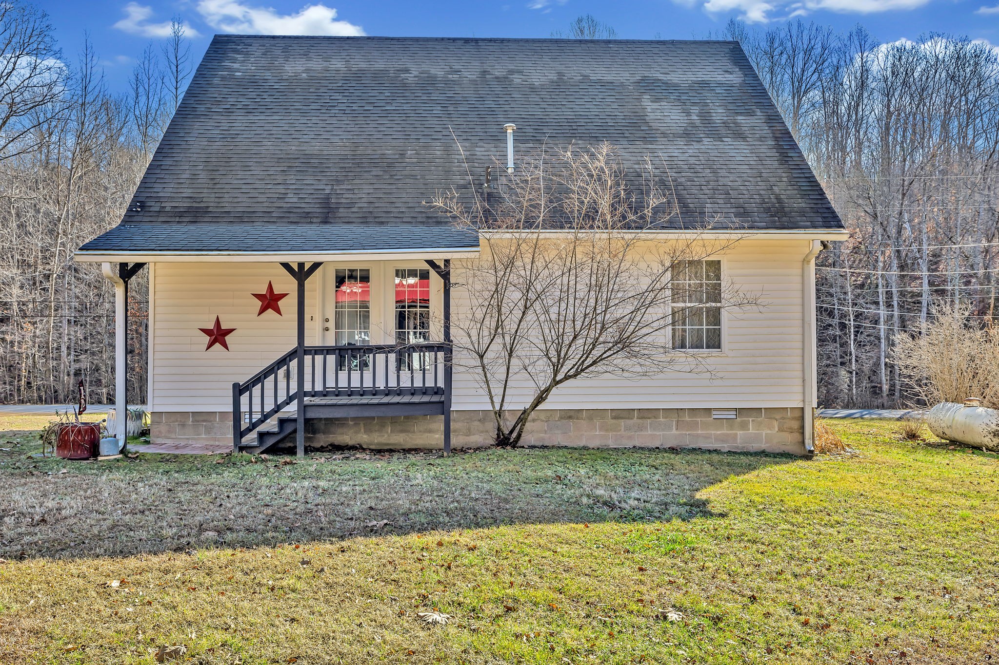 293 Slippery Road Hohenwald, TN 38462 - Photo 33 of 36 a view of outdoor space yard and basketball court