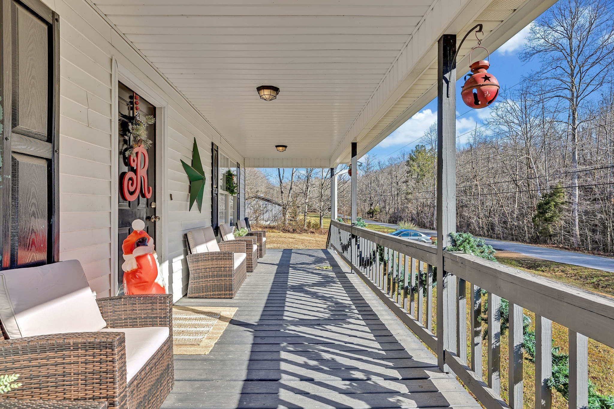 293 Slippery Road Hohenwald, TN 38462 - Photo 8 of 36 a balcony view with flat screen tv