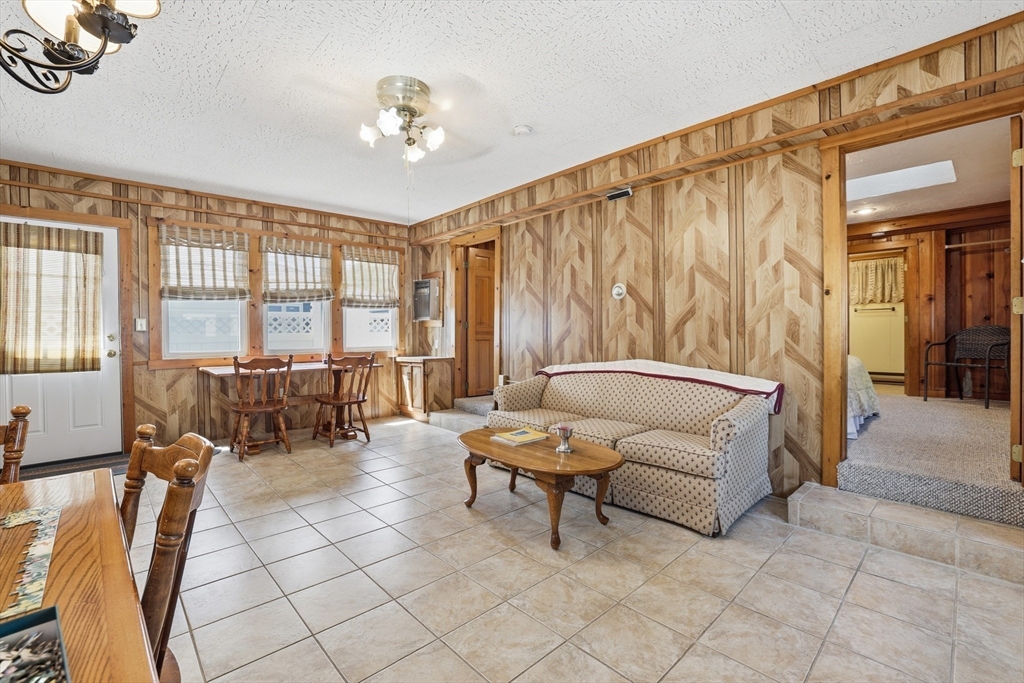 7 Swift Avenue Wareham, MA 02571 - Photo 16 of 42 a living room with furniture and a large window