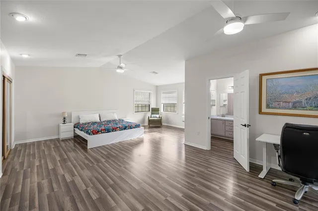 a bathroom with a double vanity sink and mirror